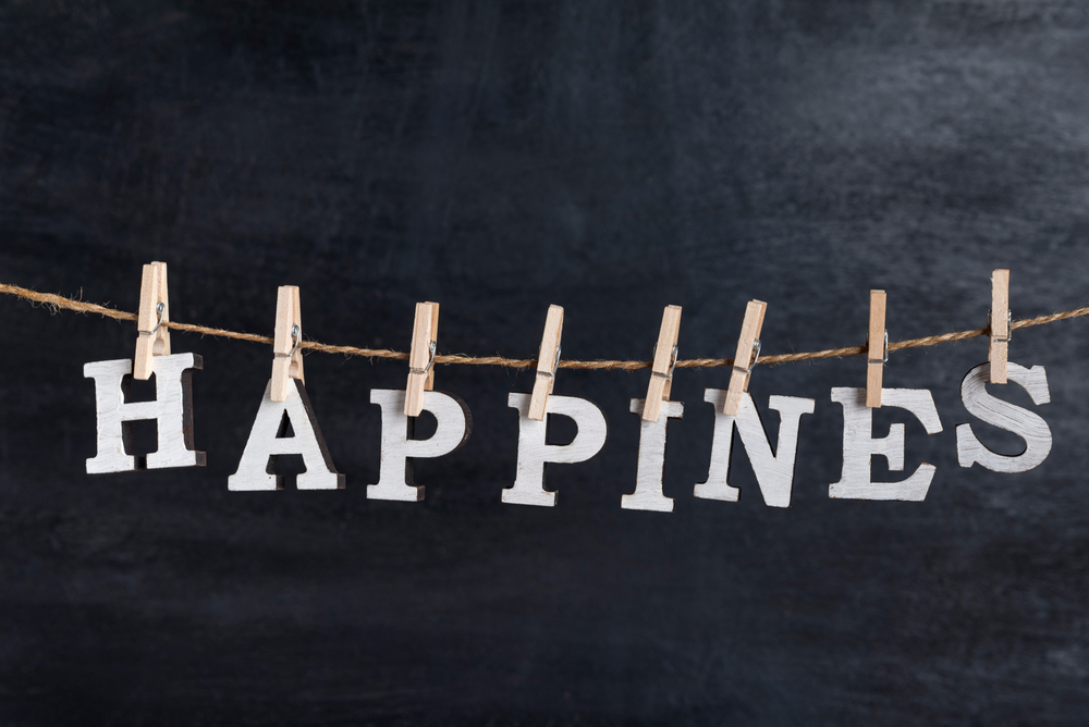 Word,Happines,Held,On,A,Clothespin,On,A,Rope,Against